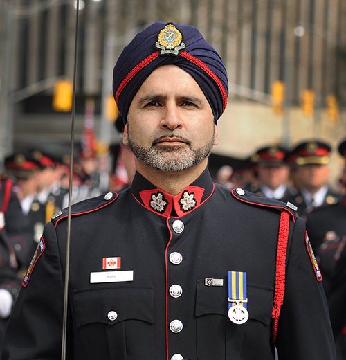A male member of the HRPS Honour Guard marches at the Ontario Police Memorial in Toronto in 2018
