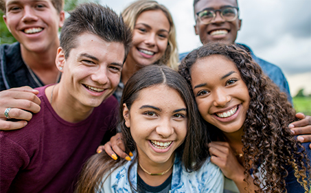 A group of smiling teens