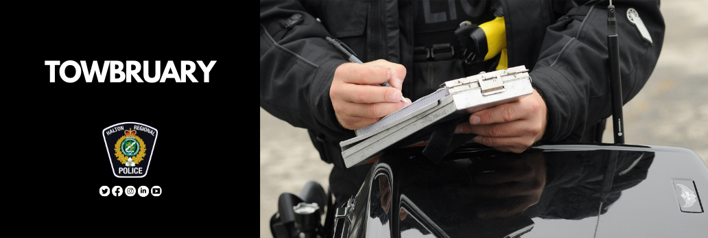 Officer writing ticket