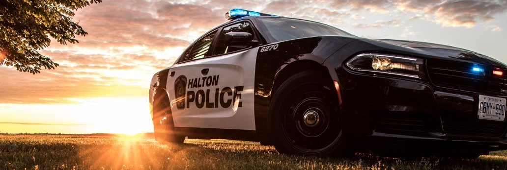 Halton Police Cruiser with sunset behind