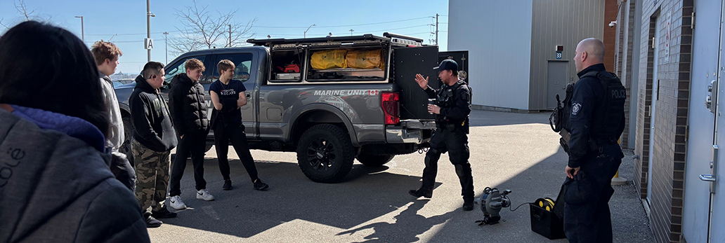 Marine unit putting a demonstration for youths
