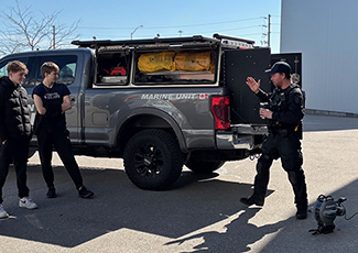 Marine unit putting a demonstration for youths