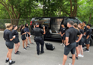 YIPI students being taught how fingerprinting works