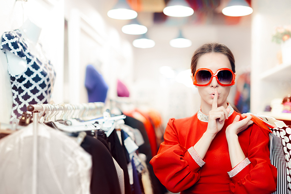 A female shoplifting in a store