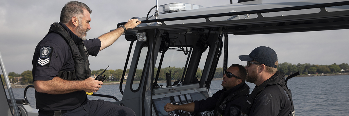 Marine officers talking on a boat