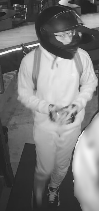 Suspect wearing a motorcycle helmet