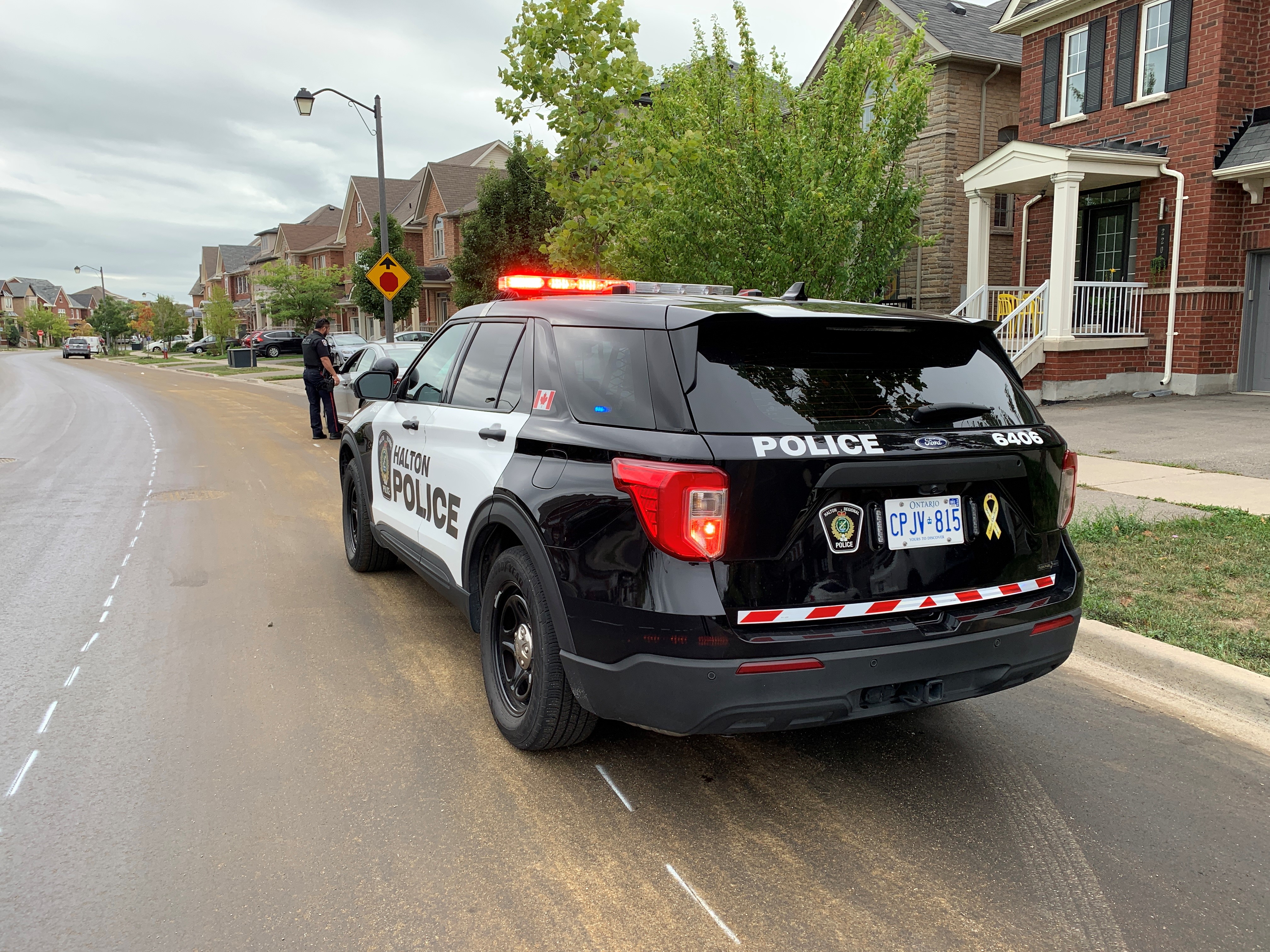 HRPS officer pulling over a vehicle