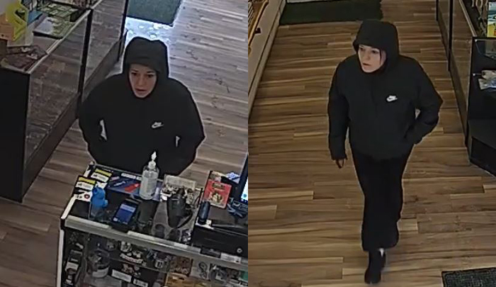 Female robbery suspect dressed in all black clothing