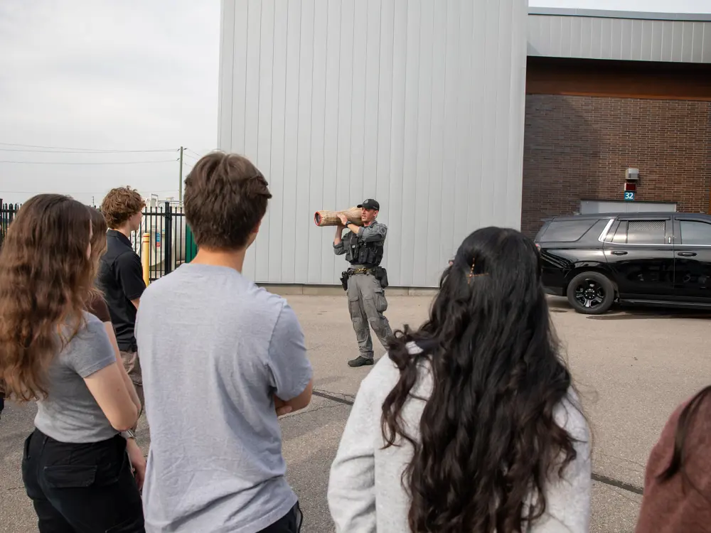 Youths learning about the Canine Unit