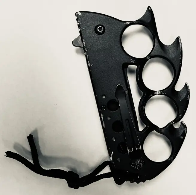 Prohibited Finger Ring (or Brass Knuckles) with Projecting Blades